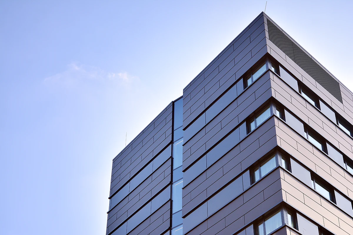 modern-office-building-with-white-metallic-panel-facade-windows